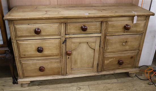 A late Victorian pine dresser base, W.144cm